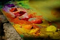 Artist brush mix color oil painting on palette Royalty Free Stock Photo
