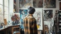 Artist Contemplating Artwork in Studio