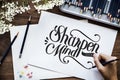 An artist creating hand lettering artwork Royalty Free Stock Photo