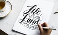 An artist creating hand lettering artwork