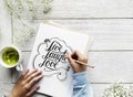 An artist creating hand lettering artwork from motivation quote Royalty Free Stock Photo