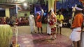 Artist dancing in crowd for hindu rituals