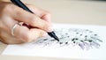 Artist desk top view pen, pencil mandala flower floral hand drawing