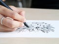 Artist desk top view pen, pencil mandala flower floral hand drawing