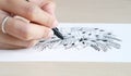 Artist desk top view pen, pencil mandala flower floral hand drawing