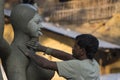 Artist doing a fine retouching job on a Clay idols of hindu godess at Kumartuli,Kolkata,India