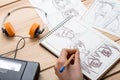 Artist drawing an anime comic book in a studio Royalty Free Stock Photo