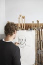 Artist Drawing Charcoal Portrait In Studio Royalty Free Stock Photo