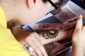 Artist drawing henna, Indian mehndi