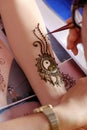Artist drawing henna, Indian mehndi