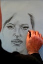 Artist drawing a portrait.