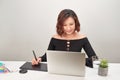 An artist drawing something on graphic tablet at the office Royalty Free Stock Photo