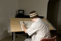 Artist at Drawing Table Royalty Free Stock Photo