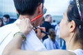 The artist draws a temporary tattoo on the guy`s neck with cosmetic pencil