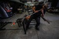 Artist glass blower blowing in his cane the glass paste. A glass crafter is burning and blowing an art piece Royalty Free Stock Photo