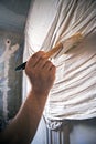 Artist in the process of painting the wall Royalty Free Stock Photo