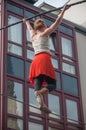 The artist Johanne Humblet tightrope walker performance during four hours in Mulhouse