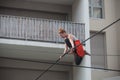 the artist Johanne Humblet tightrope walker performance during four hours in Mulhouse