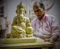 An artist making a sculpture of ganpati bappa indian god Royalty Free Stock Photo
