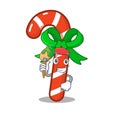 Artist mascot candy cane in cartoon jars