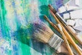 Artist paint brushes and paint tubes of paint over Royalty Free Stock Photo