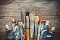 Artist paintbrushes, paint tubes and palette knife closeup.