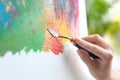 Artist painting on canvas with spatula Royalty Free Stock Photo