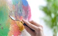 Artist painting on canvas with spatula Royalty Free Stock Photo