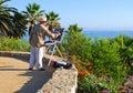 An artist painting in Heisler Park, Laguna Beach, CA