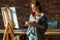 Artist painting studio workspace easel mix palette Royalty Free Stock Photo