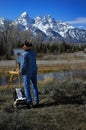 Artist Painting Teton Mountain Range in Wyoming