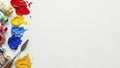 Artist Paints and Brushes on White Surface Royalty Free Stock Photo
