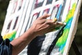 Artist Paints Canvas With His Fingers At Atlanta Arts Festival