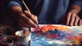 Artist paints a picture of oil paints. Hand of artist holding a brush. Hand painting concept Royalty Free Stock Photo