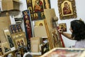 Artist paiting icons in icon painting studio in Kalabaka, Greece Royalty Free Stock Photo