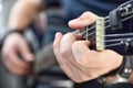 Artist playing on acoustic guitar Royalty Free Stock Photo