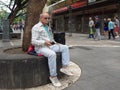 Artist prepares to sing on a Cordoba street