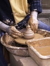 Artist sculpting clay