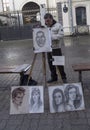 Artist selling paintings in the street,kazan,russian federation