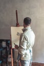 Artist sketching on easel Royalty Free Stock Photo