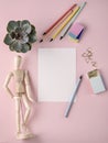 Artist tools on pink pastel board. Royalty Free Stock Photo