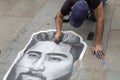 Artist who Paints a Portrait with Chalks on Public Outdoor Ground