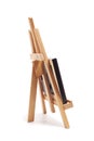 Artist wooden easel with canvas isolated on white