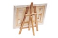 Artist wooden easel with canvas isolated on white