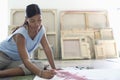 Artist Working on Canvas on Floor of Studio Royalty Free Stock Photo