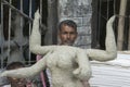 Artist working on a Clay idols of hindu godess at Kumartuli,Kolkata,India