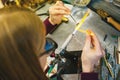 Artist in workshop making glass bead Royalty Free Stock Photo