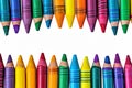 Artistic arrangement crayons form a colorful border on a white surface