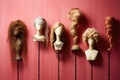 artistic arrangement of wigs in various stages