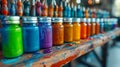 Artistic Array of Paintbrushes Resting in Jars of Blue Green Red and Orange Paint a Vivid Display of Art Tools